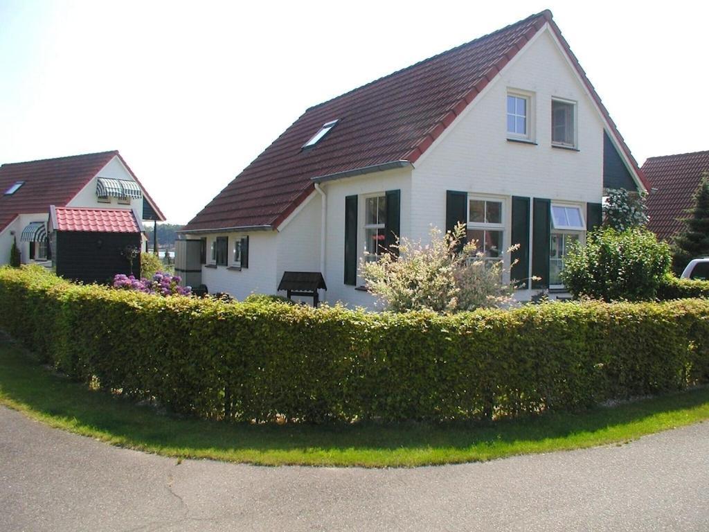 Freistehendes Ferienhaus Am See Naehe Roermond Heel Esterno foto
