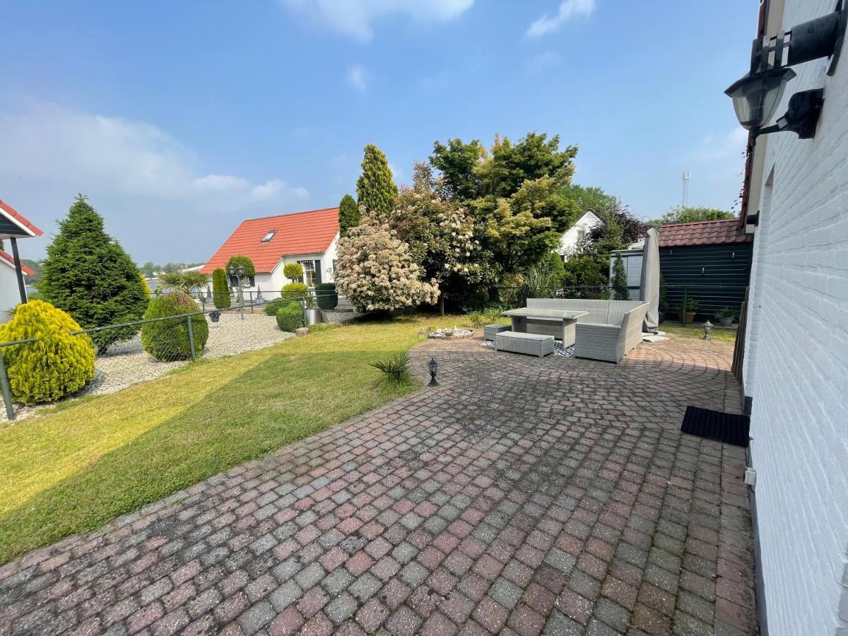 Freistehendes Ferienhaus Am See Naehe Roermond Heel Esterno foto